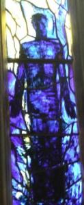 Stained glass depiction of Jesus in Gloucester Cathedral