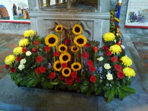 A harvest time floral creation in Hereford cathedral